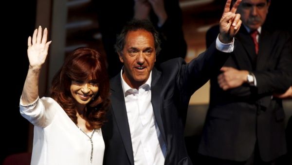 Argentina's President Cristina Fernandez and presidential candidate Scioli gesture during a ceremony in Buenos Aires.