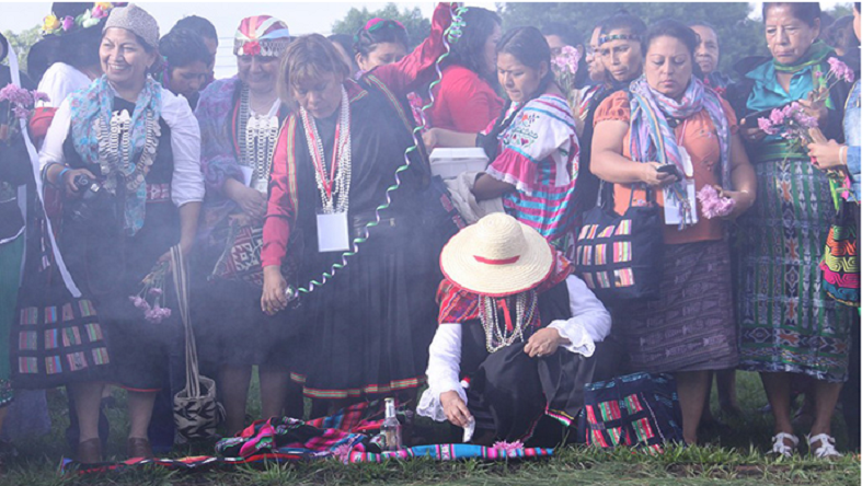 Indigenous women inaugurate their meeting with a spiritual Mayan ceremony.