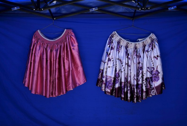 Skirts are seen at the fair of the Cholita fashion show at Villa Esperanza.