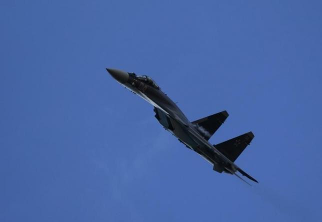 A Sukhoi SU-35 fighter aircraft performs during the 'Aviadarts' military aviation competition at the Dubrovichi range near Ryazan, Russia, Aug. 2, 2015.