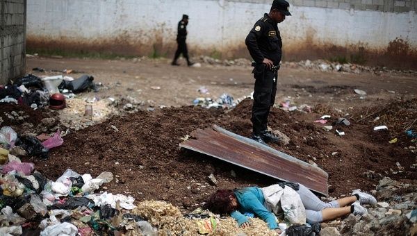 The woman in the photo is one of thousands of victims of femicide in Guatemala over the past 11 years. She was found in a trash dump just outside of Guatemala City in July 2013. 