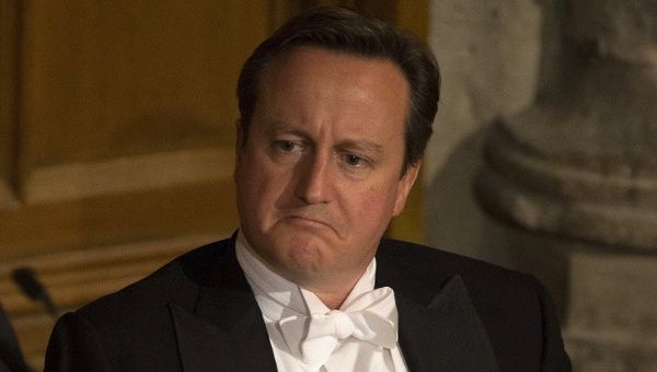 British Prime Minister David Cameron reacts during a speech at the Lord Mayor's Banquet in London, Britain Nov. 16, 2015.