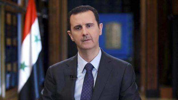 Syrian President Bashar Assad speaks during an interview with teleSUR in 2014.