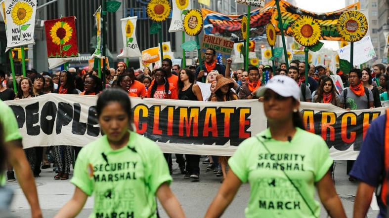People take part in a climate march in New York on Sept. 21, 2014.