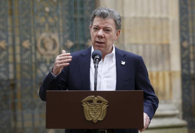 Colombia's President Juan Manuel Santos speaks after casting his vote during local and regional elections in Bogota, Colombia Oct.25, 2015
