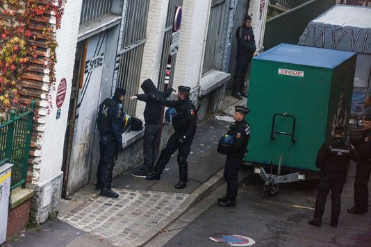 Police raid in a squad of Seine-Saint Denis, a Parisian suburb, three days before the inauguration of the COP 21.
