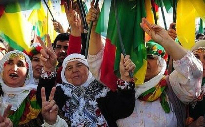 Kurdish women wave PKK flags as they celebrate Nowruz, the Persian new year. 