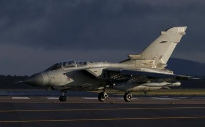 A Royal Air Force Tornado, similar to aircraft to be used in Syria, lands at RAF Lossiemouth in Scotland, December 2, 2015.  