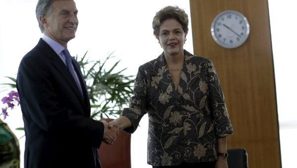 Brazil's President Dilma Rousseff greets Argentina's President-elect Mauricio Macri during a meeting at the Planalto Palace in Brasilia, Brazil December 4, 2015.