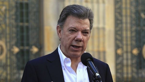 Colombian President Juan Manuel Santos launches new Commission to investigate the police corruption scandal.