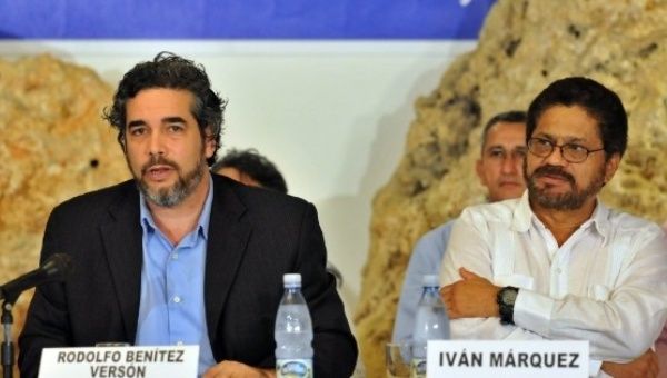 Cuban guarantor Rodolfo Benitez Verson (L) at the Colombian peace talks in Havana with FARC leader Ivan Marquez (R). 