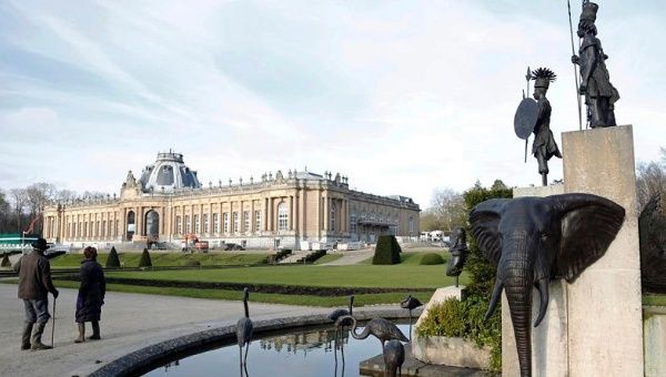 A sculpture shows former Belgian King Leopold II surrounded by animals and African warriors in the park of the Royal Museum for Central Africa in Tervuren, near Brussels.