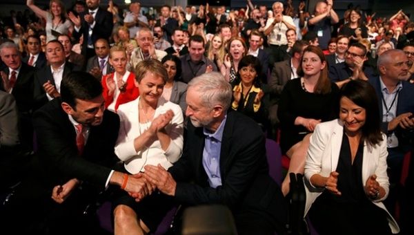 Fellow candidates congratulate Jeremy Corbyn on winning the Labour leadership.