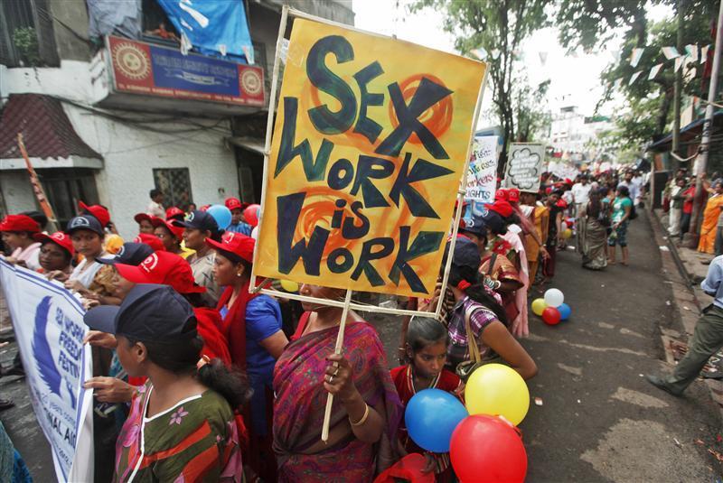 Participants take part in a rally as part of the week-long sex workers' freedom festival at the Sonagachi Red-light area in Kolkata July 24, 2012.
