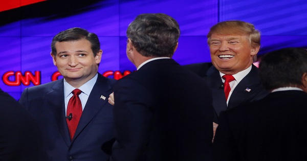 Ted Cruz, Jeb Bush and Donald Trump talk at the end of debate.