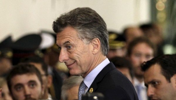 Argentina's President Mauricio Macri smiles at the Summit of Heads of State of Mercosur.