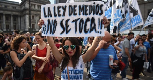 Demonstrators protest against President Macri's neoliberal changes and in support of the Argentina's Media Law in Buenos Aires Dec. 17, 2015.