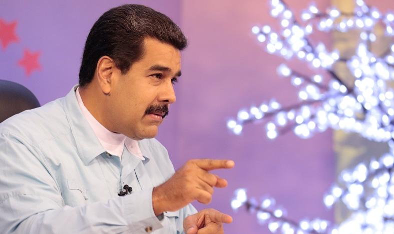 Venezuelan President Nicolas Maduro hosts the 52nd edition of his television program from Caracas, Venezuela, Dec. 29, 2015.