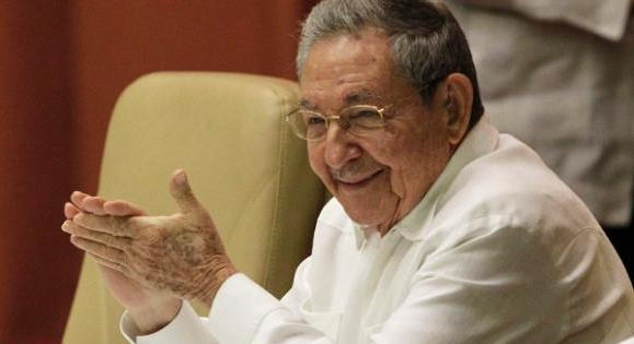 Cuba's President Raul Castro greets members of the National Assembly at the start of a session in Havana, Dec. 20, 2014.