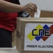 A voter deposits their ballot during parliamentary elections held in Venezuela, Dec. 6. 2015.