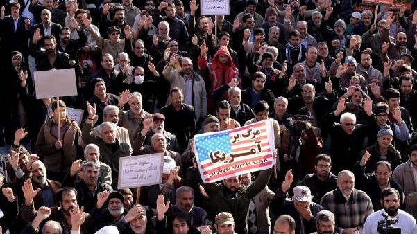 Protesters chant slogans during a demonstration against the execution of Sheikh Nimr al-Nimr in Saudi Arabia, at Imam Hussein square in Tehran Jan. 4, 2016.