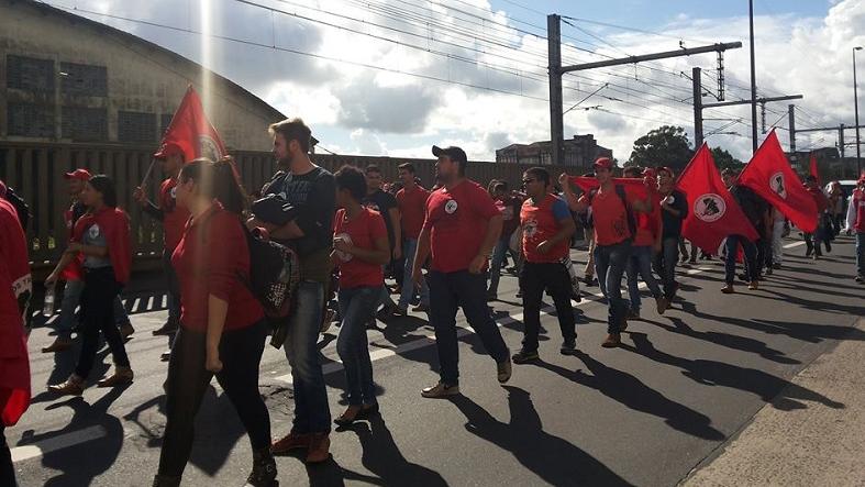 Supporters of Brazil's Landless Rural Workers Movement march during the National Day of Action on May 29, 2015.