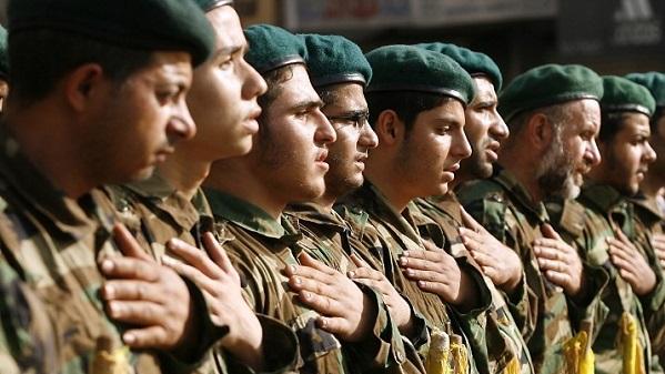 Hezbollah members mourn during the funeral of a comrade who was killed in combat alongside Syrian government forces in the Qalamun region, on May 26, 2015, in the southern Lebanese village of Ghaziyeh.