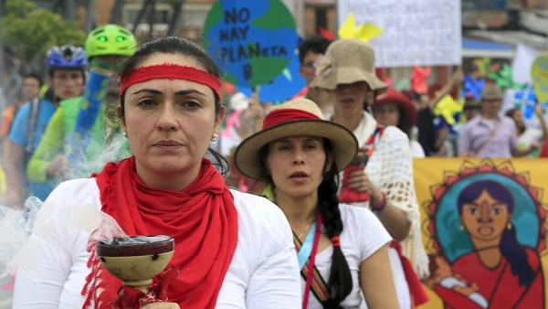 Activists take part in a demonstration in Bogota, Colombia.
