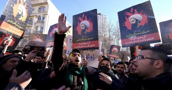 Iranian protesters chant slogans during a demonstration against the execution of Nimr in Saudi Arabia, outside the Saudi Arabian Embassy in Tehran Jan., 3, 2016.