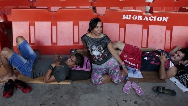 Cuban migrants rests at a temporary shelter in the border between Costa Rica and Nicaragua in Penas Blancas, Costa Rica, Dec. 24. 2015.