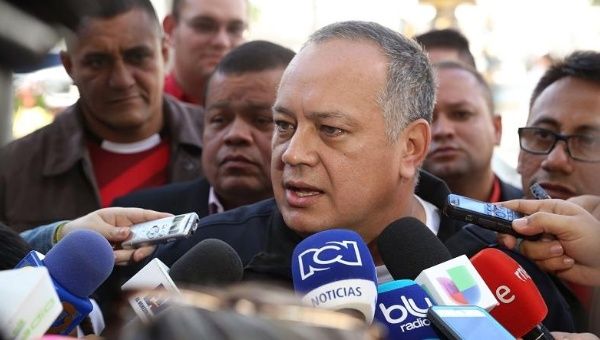 Socialist lawmaker Diosdado Cabello speaks to the press outside the National Assembly, Caracas, Venezuela, Jan. 6, 2016.