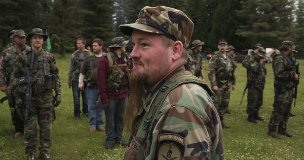 The Light Foot Militia members from Idaho and Washington, formed in 2009 after President Obama’s inauguration, line up for training, July 18, 2013.