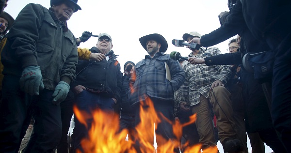 Ammon Bundy (C) meets with supporters and the media at Malheur National Wildlife Refuge near Burns, Oregon.