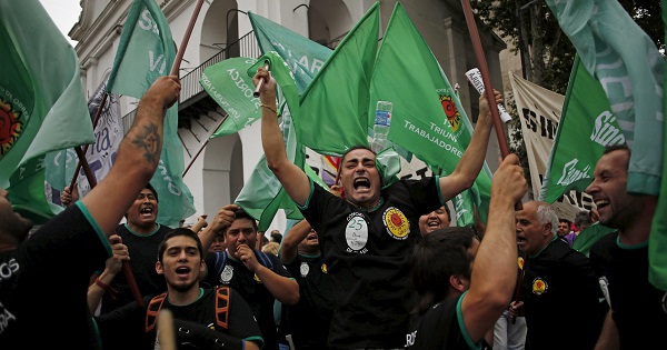 Demonstrators shout slogans during a protest against the economic policies implemented by Argentina's President Mauricio Macri in Buenos Aires Dec. 22, 2015.