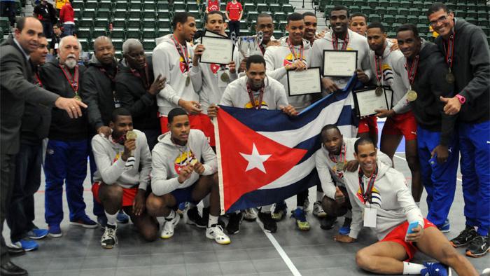 The Cuban men's volleyball team poses after their victory over Canada that will send them the 2016 Olympic Games, Edmonton, Canada, Jan. 10, 2016.
