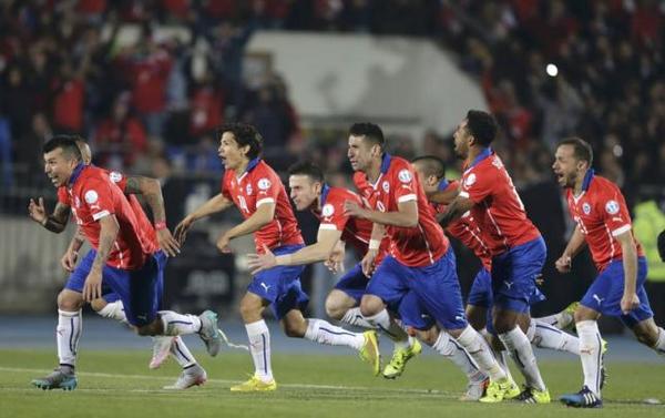 The Chilean soccer team celebrates a goal.