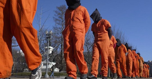 Members of the group Witness Against Torture protest the Guantanamo Bay Prison.