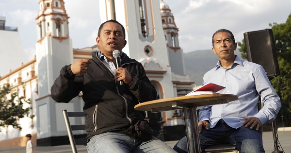 Economy Minister Luis Salas speaks at the forum, 