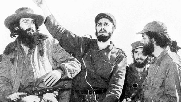 Cuban revolutionaries alongside Fidel Castro.