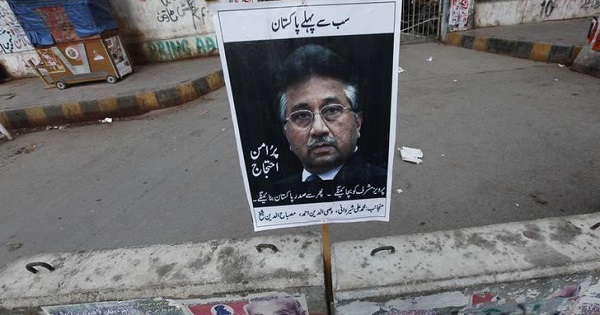 A placard of former President Pervez Musharraf is left behind by his supporter after a protest demanding a fair trial for him.