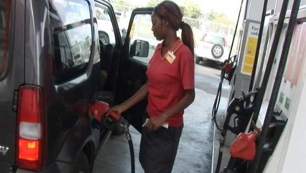 Drivers fill up at a gas station in Castries, Saint Lucia