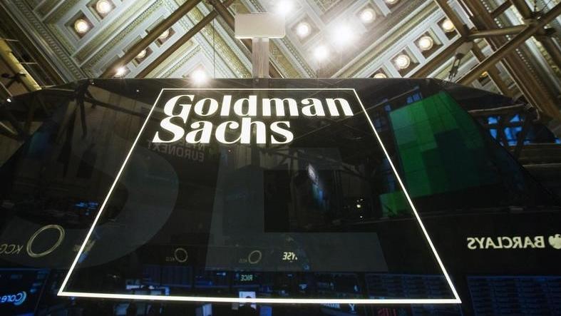 A Goldman Sachs sign is seen above the floor of the New York Stock Exchange shortly after the opening bell in the Manhattan borough of New York Jan. 24, 2014.