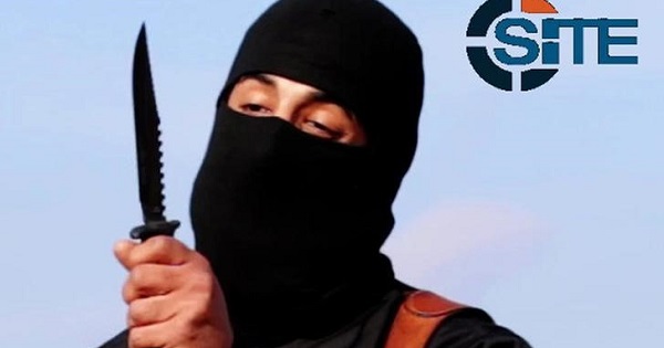 A masked, black-clad militant,  identified by the Washington Post newspaper as Mohammed Emwazi, brandishes a knife in this still image from a 2014 video.