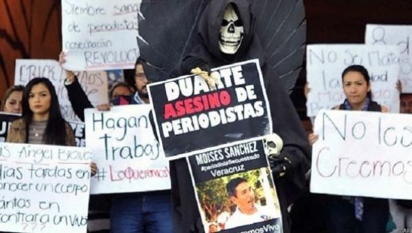 Protesters blame Governor Javier Duarte for the assassination of journalists in Veracruz, the most dangerous state in Mexico to be a media employee.