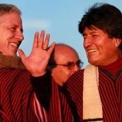 Bolivian Vice President Alvaro Garcia Linera (L) and President Evo Morales (R) smile as they celebrate 10 years in power at the Tiwanaku archaeological site in Bolivia, Jan. 21, 2016.