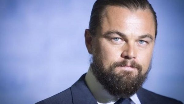 Leonardo DiCaprio used his acceptance speech at the World Economic Forum to slam Big Oil and corporate greed.