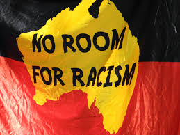 The Australian Aboriginal Flag with the words 