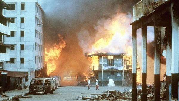 Flames engulf a building after U.S. forces invaded Panama during Operation Just Cause Dec. 20, 1989.