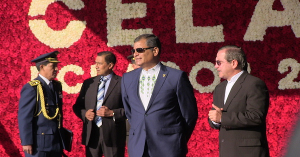 Ecuadorean President Rafael Correa (L) and his Foreign Minister Ricardo Patiño (R) during the arrival of heads of state to the CELAC summit in Quito, Ecuador.