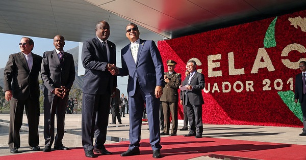 Haitian Foreign Minister Lener Renauld greets Ecuadorean President Rafael Correa ahead of the CELAC summit in Quito, Ecuador, Jan. 27, 2016.